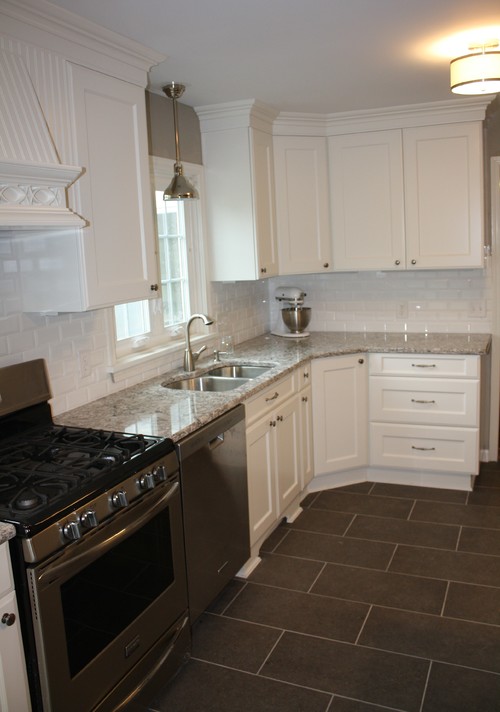 Cambria Bellingham with Glossy White Subway Tiles and Gray Ceramic Flooring in White Kitchen